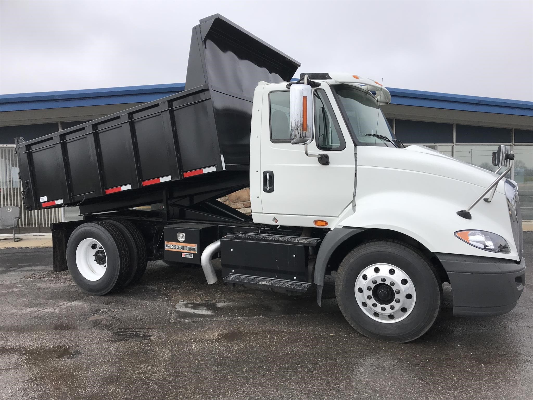bowen equipment - white dump truck